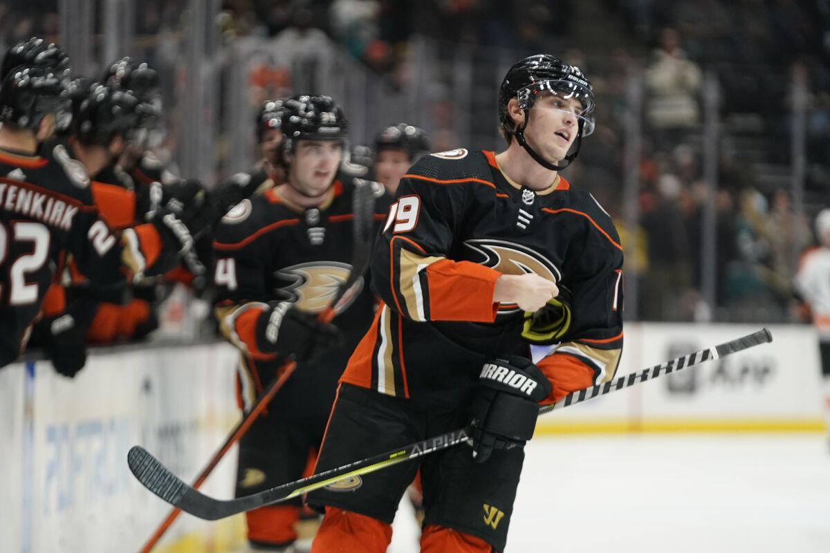 Anaheim Ducks right wing Troy Terry (19) reacts after scoring during the first period of an NHL hockey game against the Philadelphia Flyers in Anaheim, Calif., Tuesday, Jan. 4, 2022. (AP Photo/Ashley Landis)
