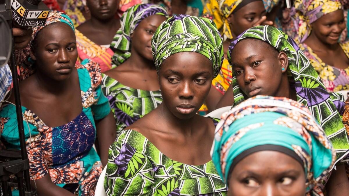 A photo released on May 30, 2017, by PGDBA & HND Mass Communication shows newly rescued Chibok schoolgirls waiting on their arrival for rehabilitation at the Women Development Center in Abuja, Nigeria.