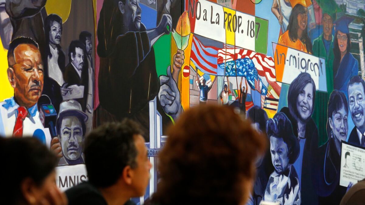People listen during a CHIRLA immigration rights workshop in Los Angeles.