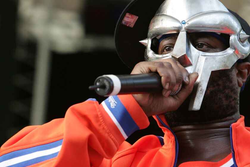 NEW YORK - JUNE 28: Rapper MF DOOM performs at a benefit concert for the Rhino Foundation at Central Park's Rumsey Playfield on June 28, 2005 in New York City. (Photo by Peter Kramer/Getty Images)