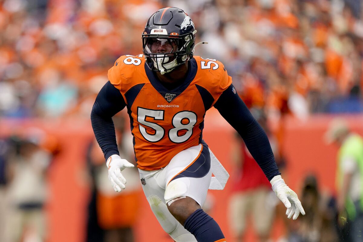 FILE - In this Sept. 15, 2019, file photo, Denver Broncos outside linebacker Von Miller (58) chases a play against the Chicago Bears during the second half of an NFL football game in Denver. Von Miller is determined to show a so-so 2019 was an oddity, not an omen. (AP Photo/Jack Dempsey, File)
