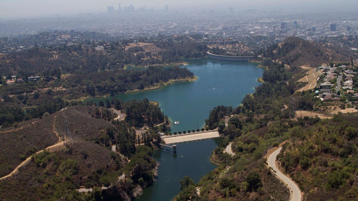 Lake Hollywood, one of L.A.'s flirty little secrets, overlooks Hollywood and, in the distance, downtown L.A.