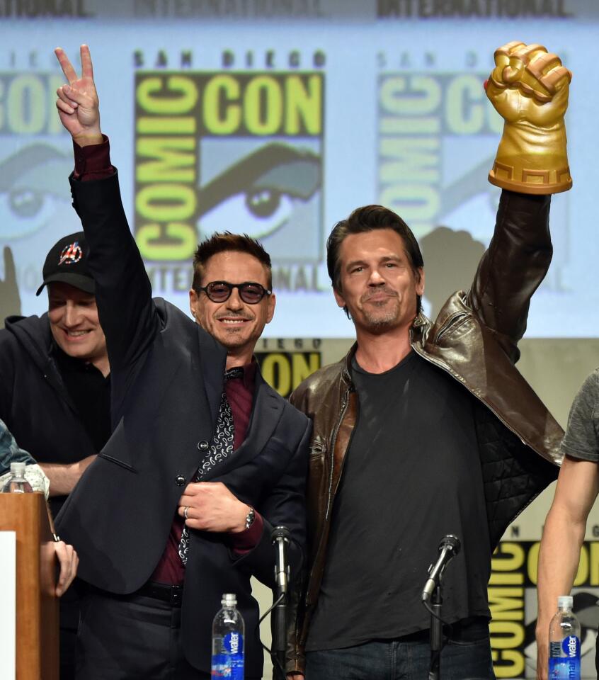 Actors Robert Downey Jr. (L) and Josh Brolin attend the Marvel Studios panel during Comic-Con International 2014 at San Diego Convention Center on July 26, 2014 in San Diego, California. (Photo by Kevin Winter/Getty Images)