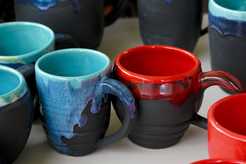 A selection of Kelvin Crosby's coffee mugs with prices starting at $ 55.  