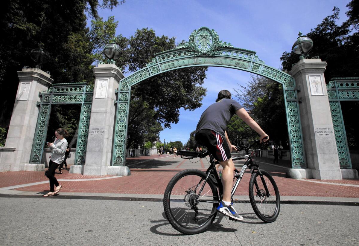 UC tuition is triple what it was in 2002, and more hikes are proposed. Above, Sather Gate at UC Berkeley.