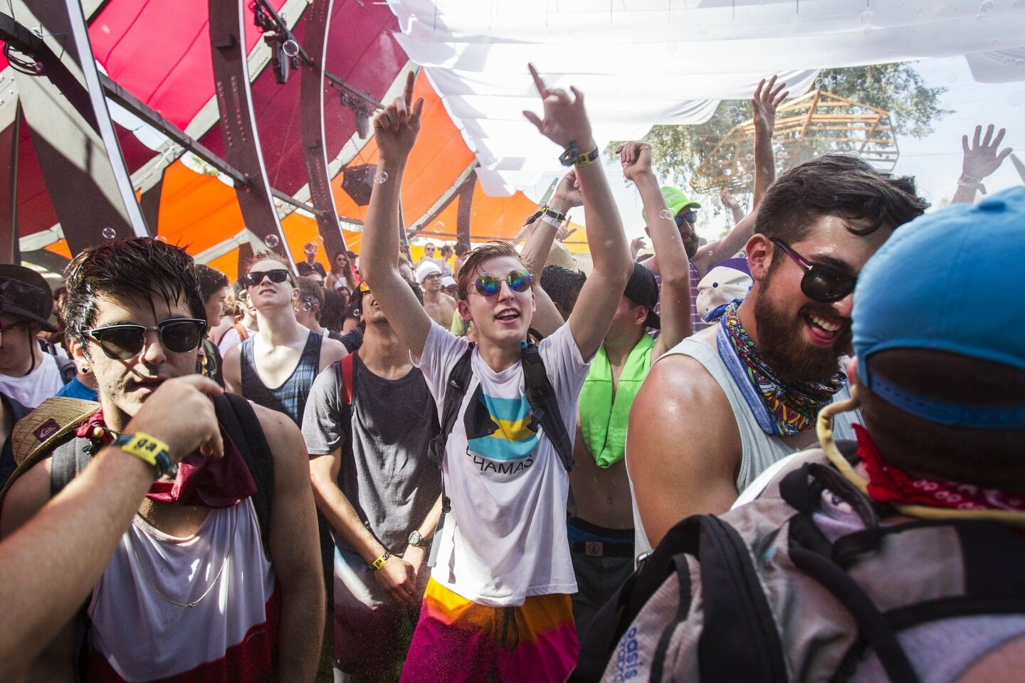 The 2015 Coachella Valley Music and Arts Festival gets underway. The Do Lab gets an early start as Coachella gets underway. Festival goers dance to pounding bass while being doused with water.