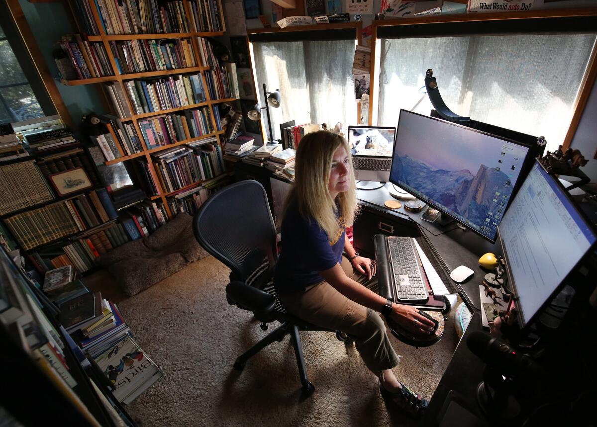 Beth Pratt works in her office at her home in Midpines, Calif., near Yosemite National Park.