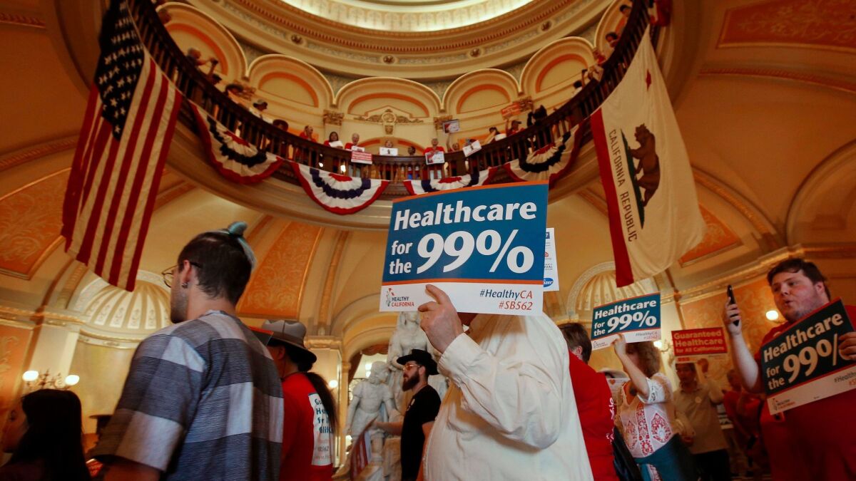 Members of the California Nurses Association and supporters rally at the state Capitol for a single-payer health plan June 28.