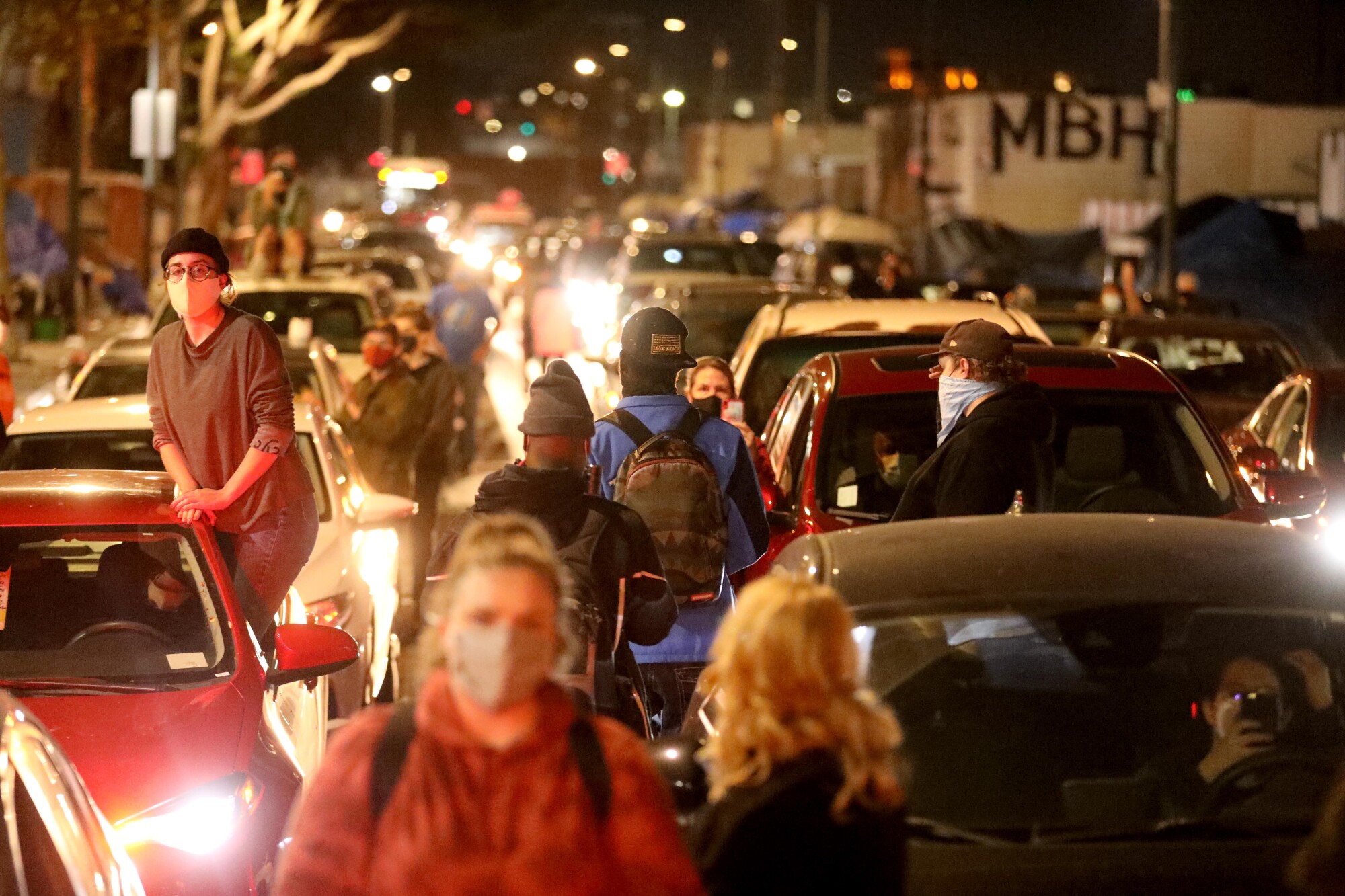 Homeless advocates and their supporters stage a "blockade'' against evangelist singer Sean Feucht in skid row