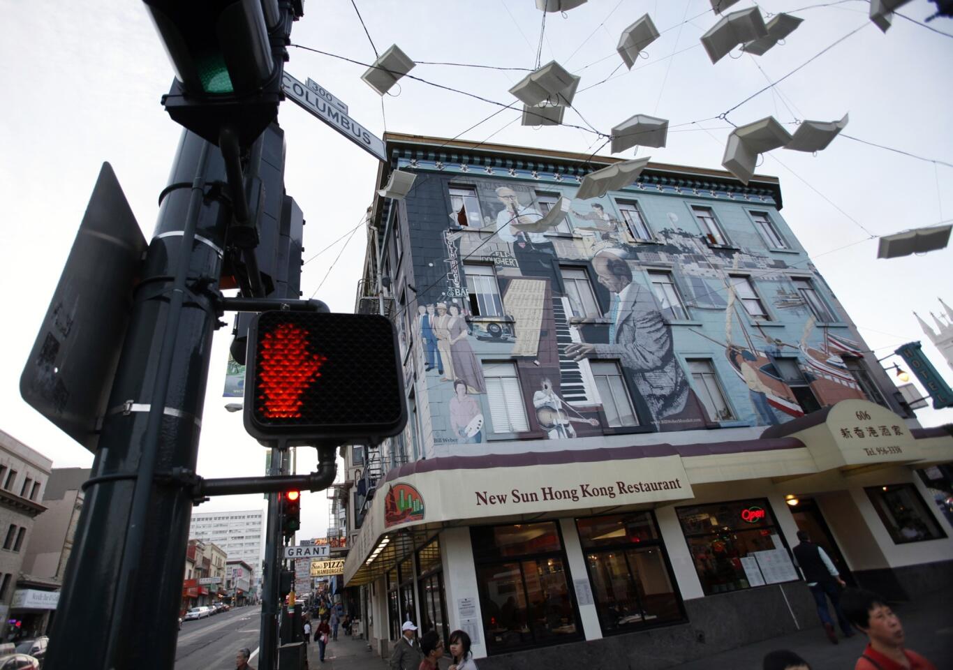 'Language of the Birds' sculpture and public mural