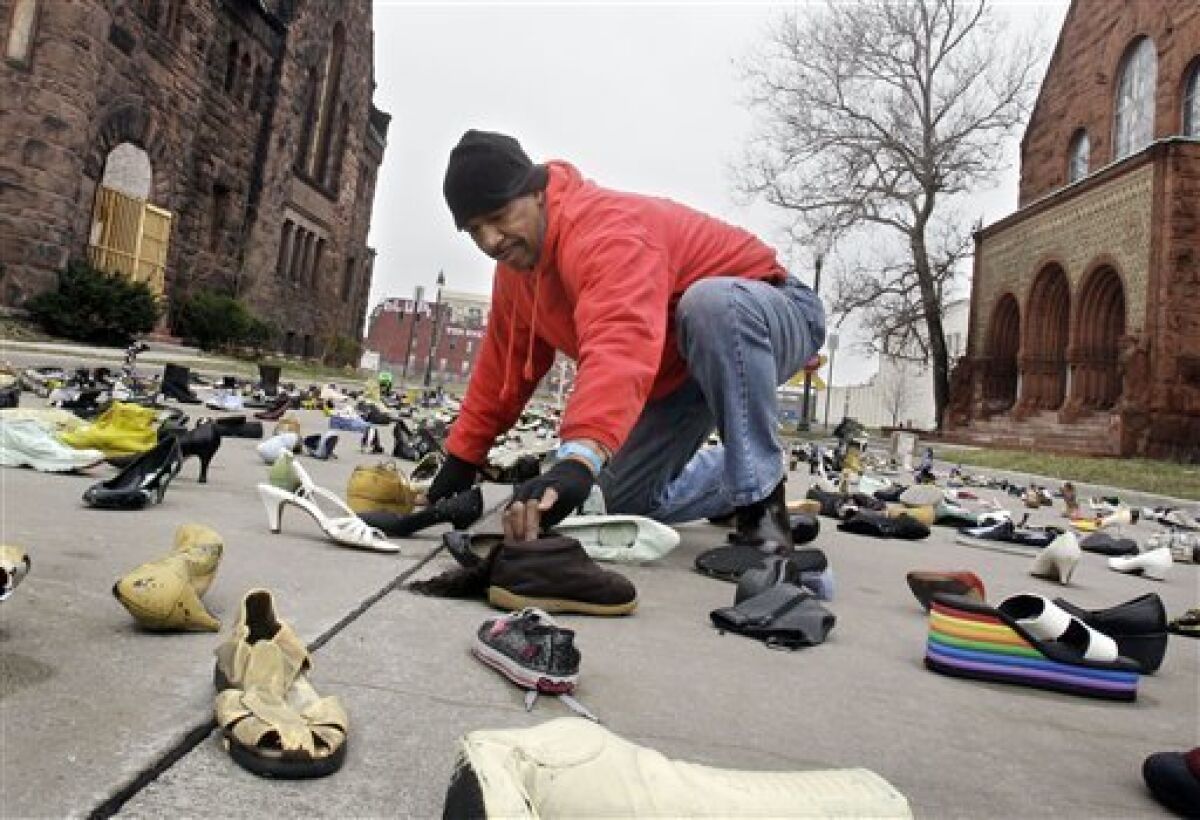 Noted Detroit artist fills city block with shoes - The San Diego  Union-Tribune