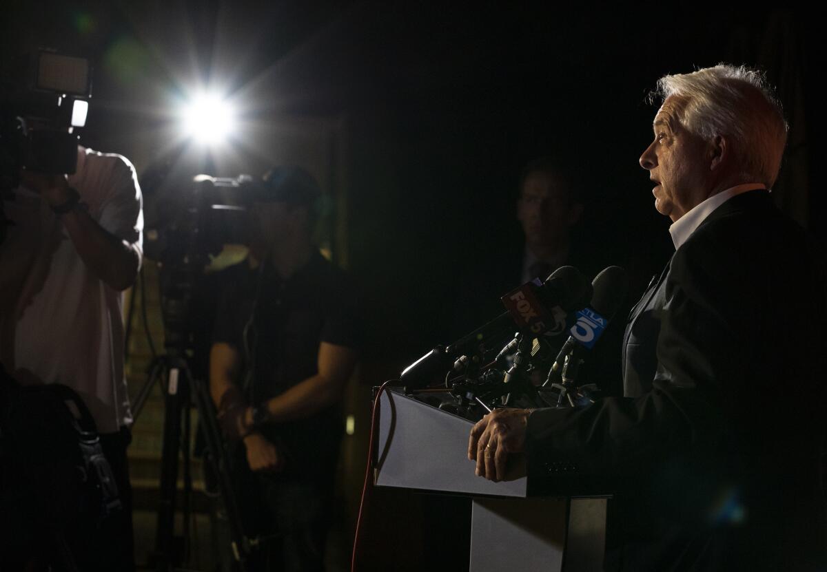 John Cox, former 2021 California Republican gubernatorial candidate, talks with news media.