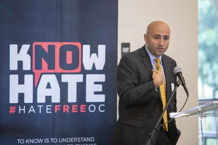 Ebrahim Baytieh, with the Orange County District Attorney's Office, speaks during the OC Human Relations Council's annual hate crime report release event at the Los Olivos Community Center in Irvine on Thursday, September 26.