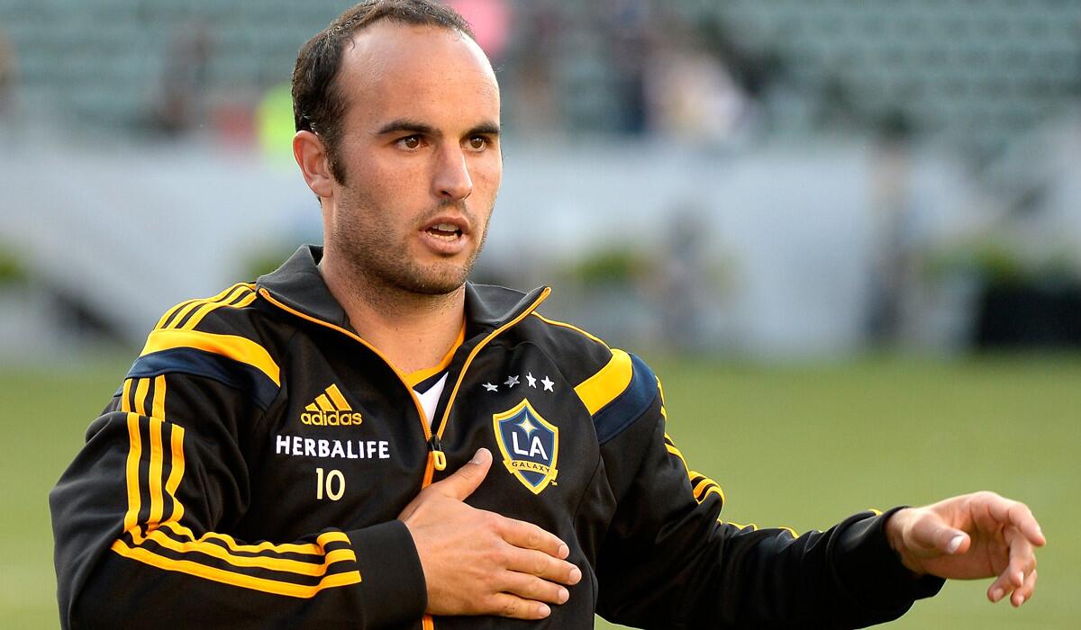 Galaxy star Landon Donovan shows his appreciation for supporters after a 4-1 victory over the Philadelphia Union at StubHub Center on May 25.