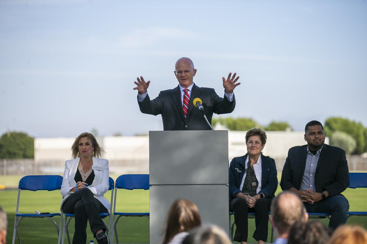 Ocean View School District Supt. Dr. Michael Conroy speaks at a podium.