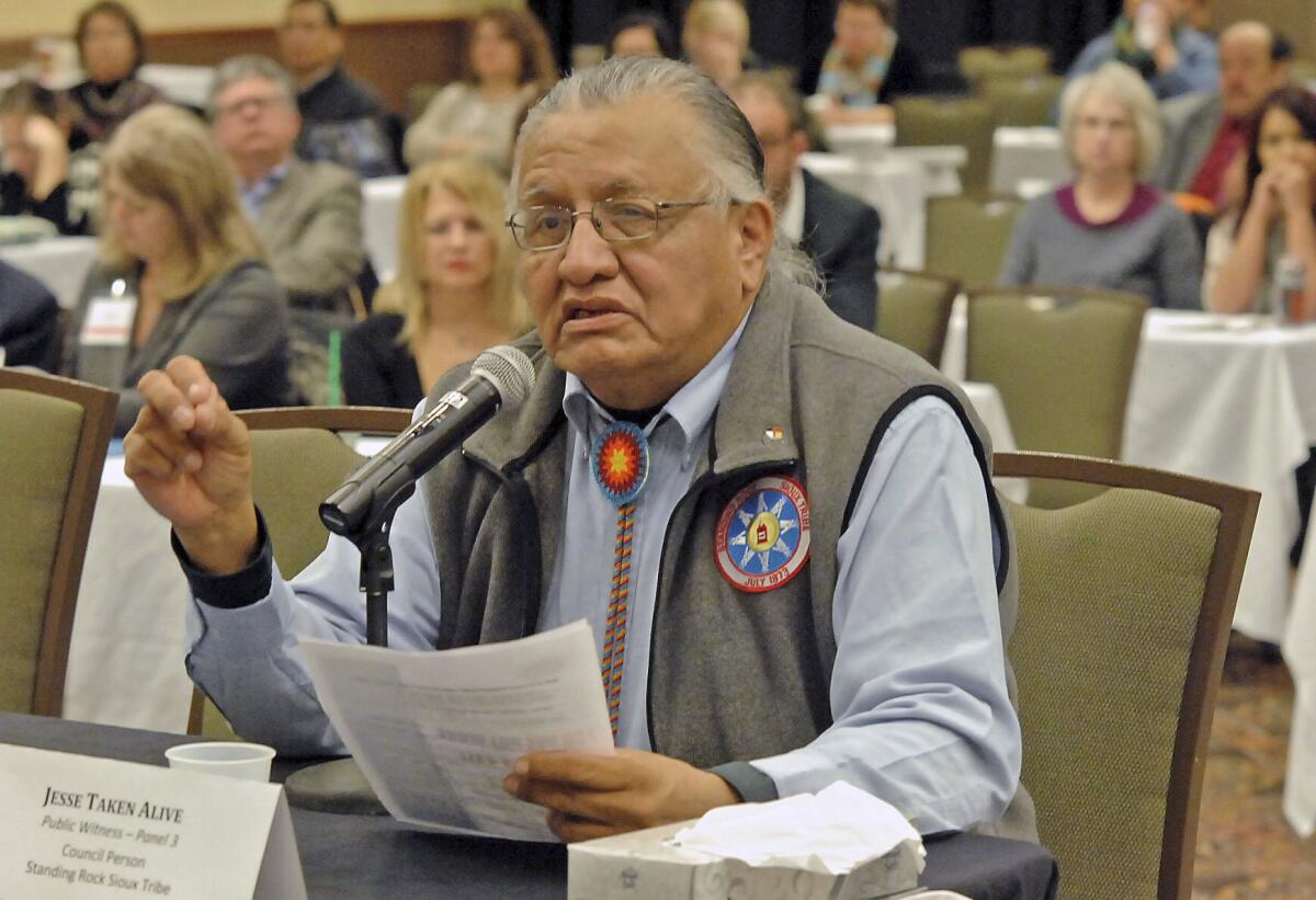 Jesse Taken Alive of the Standing Rock Sioux Tribe testifies in Bismarck, N.D., in 2013.