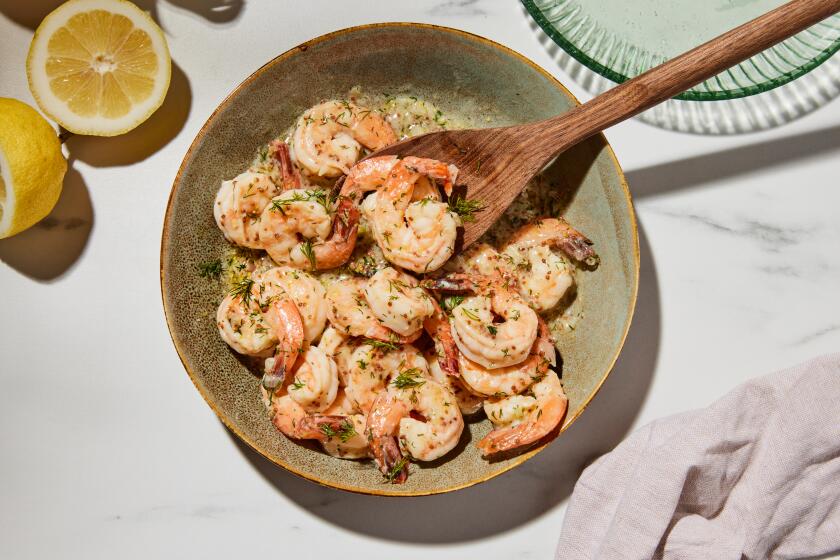 LOS ANGELES, CA - APRIL 1: Buttery shrimp with dill, featured in Jose Andres' cookbook Zaytinya, prepared in the Los Angeles Times Test Kitchen on Monday, April 1, 2024.