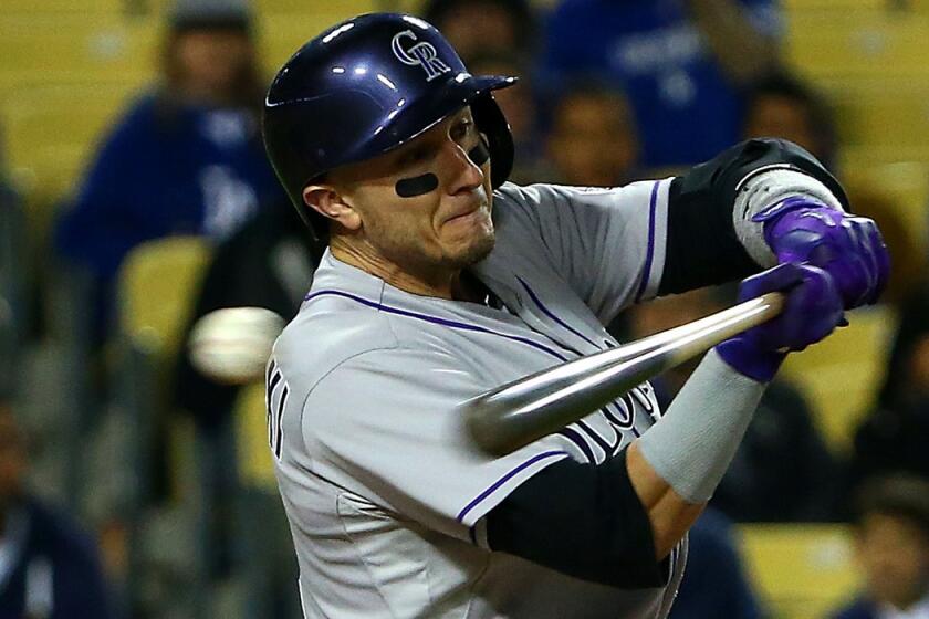 Colorado Rockies' Troy Tulowitzki strikes out swinging during a 5-4 win over the Los Angeles Dodgers at Dodger Stadium on Thursday.
