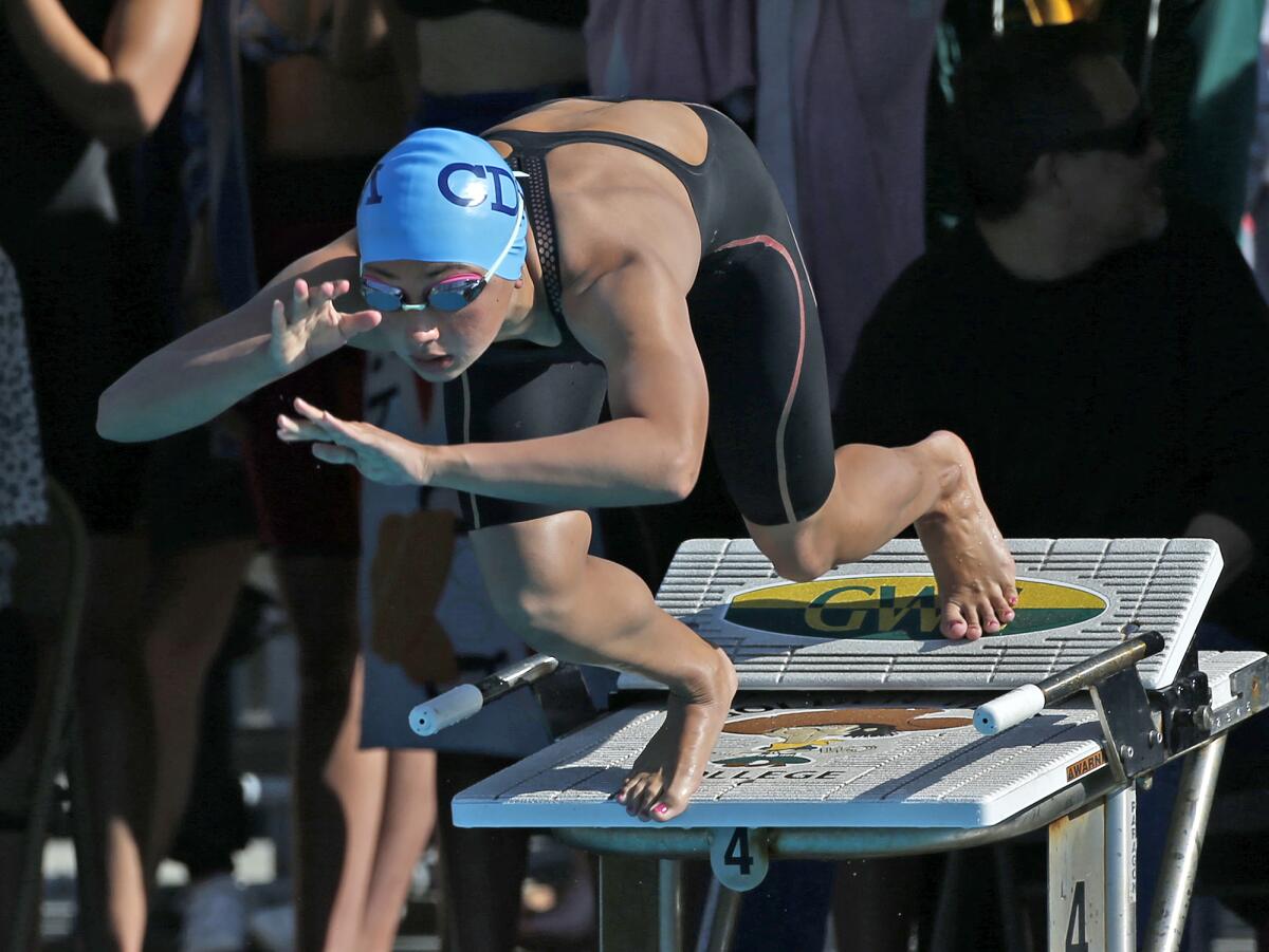 Corona del Mar's Nikki Lahey leaps from the starting position in the girls' 50 free during the Surf League swim finals.