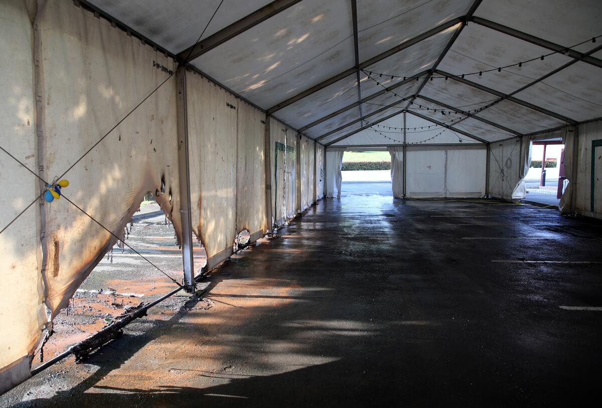 A view of the empty tent of a vaccination center after an arson attack on Saturday evening in Urrugne, southwestern France, Monday, July 19, 2021.Two Covid-19 vaccination centers were ransacked in less than 48 hours in France, over the weekend. (AP Photo/Bob Edme)