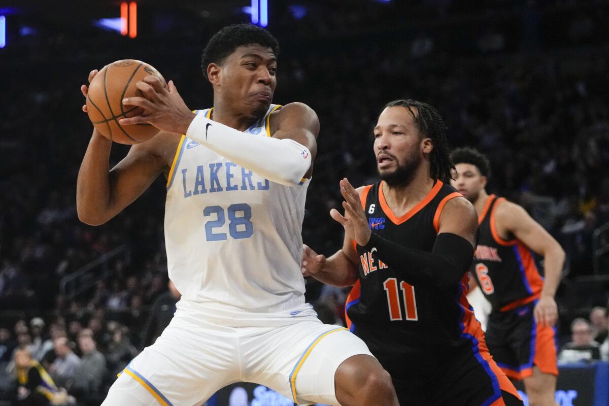 New York Knicks' Jalen Brunson defends Lakers' Rui Hachimura during the second half Tuesday.