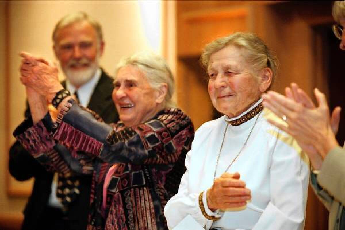 Celia Hunter, left, and Ginny Wood were honored in 2001 for their efforts in co-founding the Alaska Conservation Society.