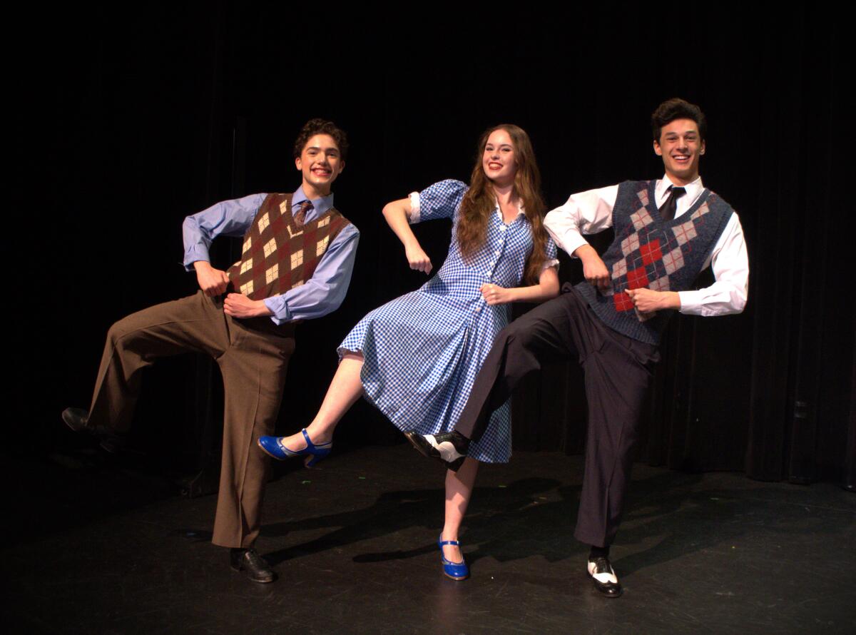 Actors Taven Blanke, Laurel Brookhyser and Landon Mariano rehearse for "Singin' in the Rain."