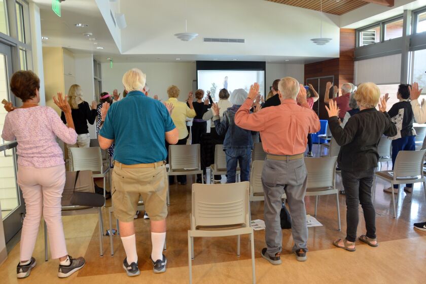 Attendees took part in the interactive portion of the UCI-Health lecture on Balance Problems and Fall Prevention at OASIS Senior Center in June.