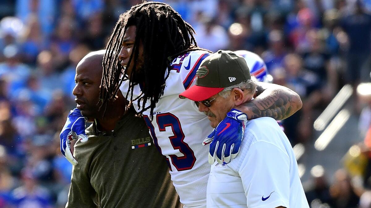 Buffalo wide receiver Kelvin Benjamin gets assistance off the field after injuring his right knee during a game against the Los Angeles Chargers on Nov. 19.
