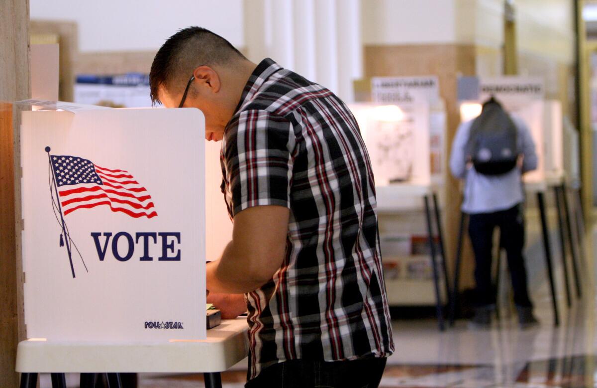 A citizen casts his ballot at Burbank City Hall during the primary election on Tuesday, June 7, 2016.