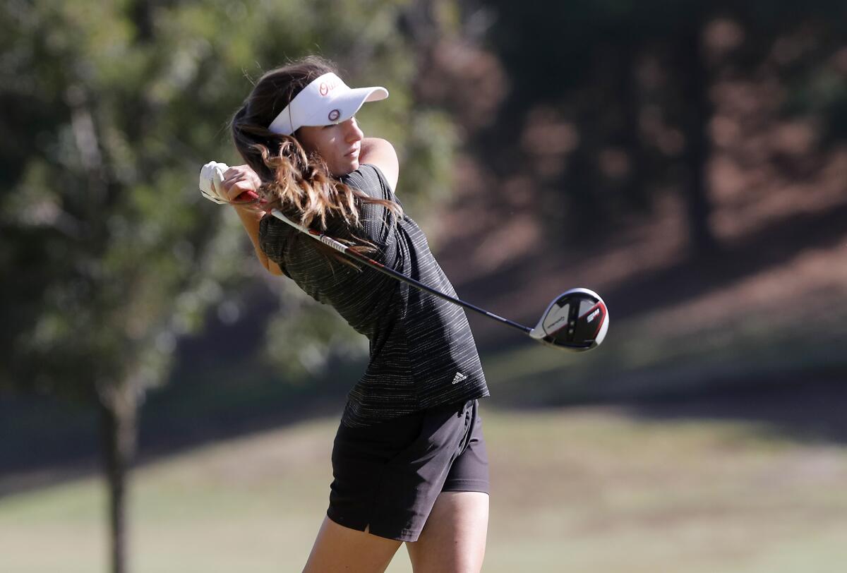 Huntington Beach's Vanessa Betancourt tees off the 11th hole in the CIF Southern Section Individual Southern Regional tournament at Los Serranos Country Club in Chino Hills on Tuesday.