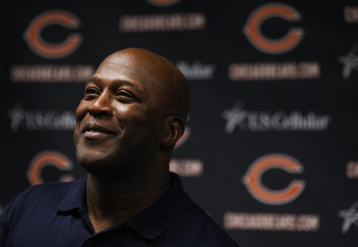 Lovie Smith shares a light moment with the media at the beginning of a press conference at Halas Hall on Nov. 25, 2009.