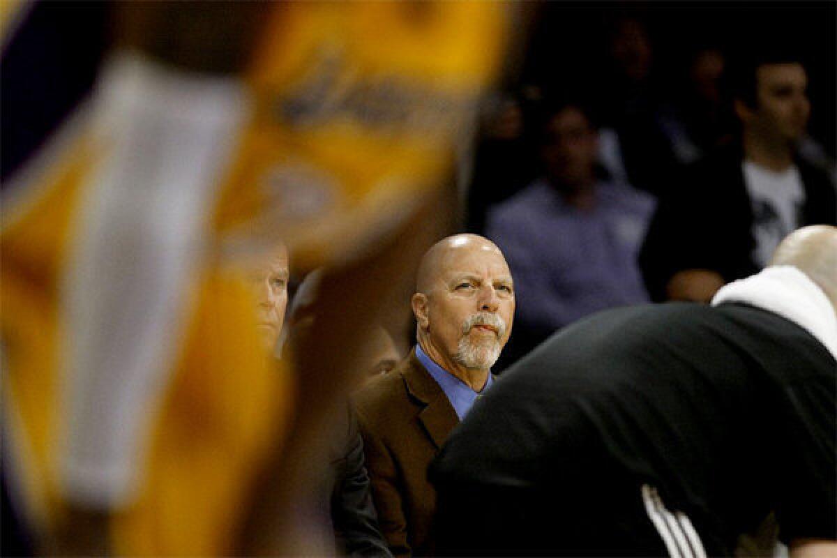 Lakers trainer Gary Vitti watches L.A. take on the Toronto Raptors.