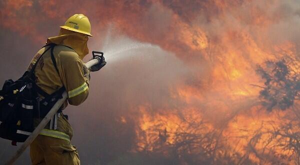 California: Turning hose on Banner flames