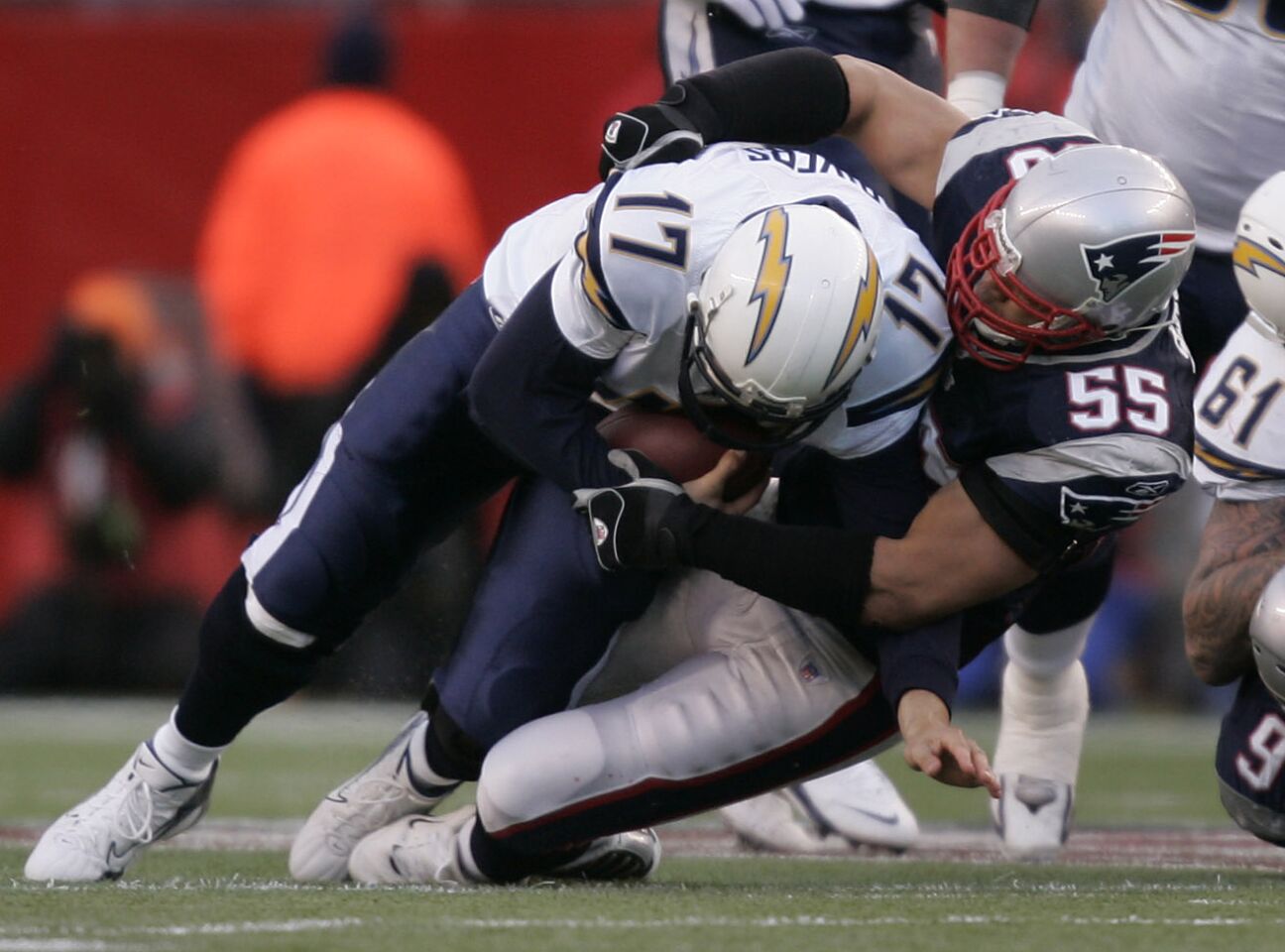 San Diego Chargers Philip Rivers is sacked by Junior Seau of the New England Patriots in the 1st qtr of the AFC Championship game on January 20, 2008 at Gillette Stadium in Foxborough.