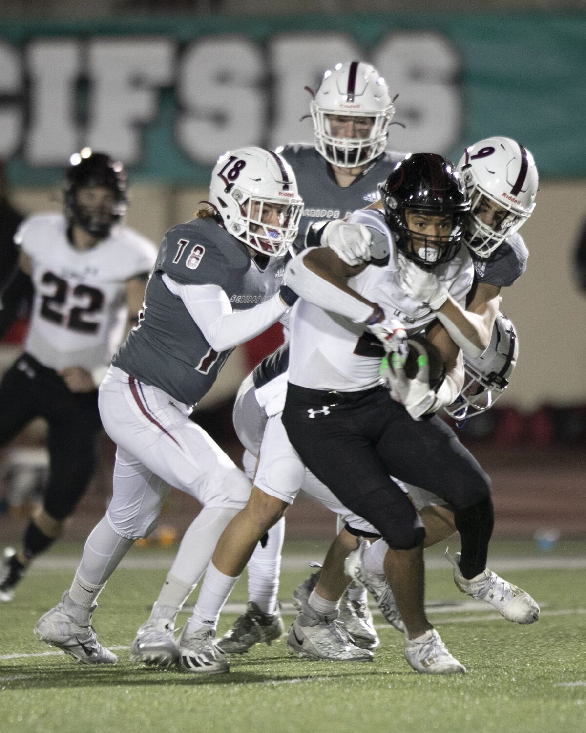 La Jolla's Makai Smith (2) carries the ball against Scripps Ranch during the Division II championship game.