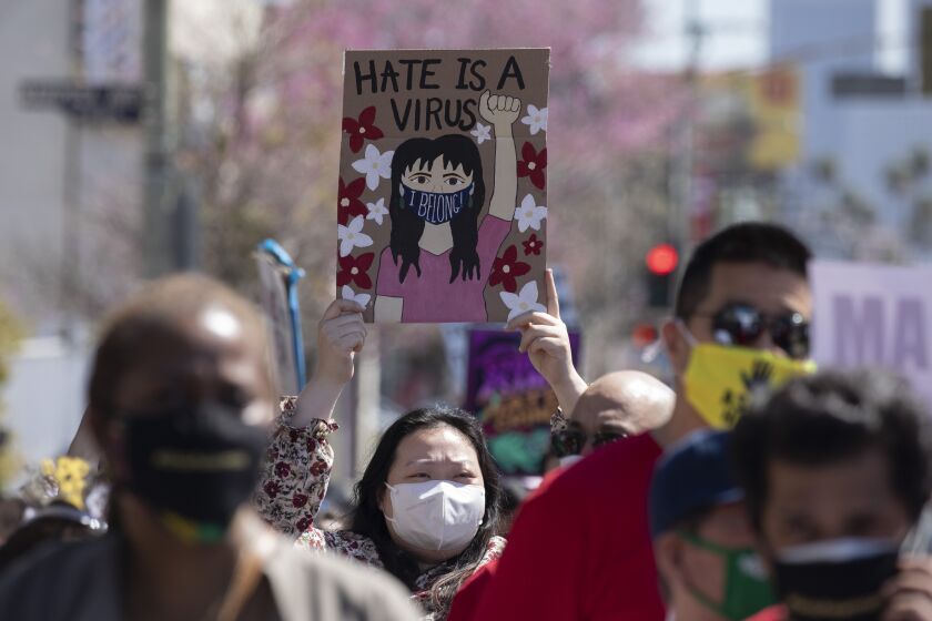 LOS ANGELES, CA - MARCH 27: A "Stop Asian Hate" rally in Koreatown on Saturday, March 27, 2021 attracted hundreds of participants. (Myung J. Chun / Los Angeles Times)