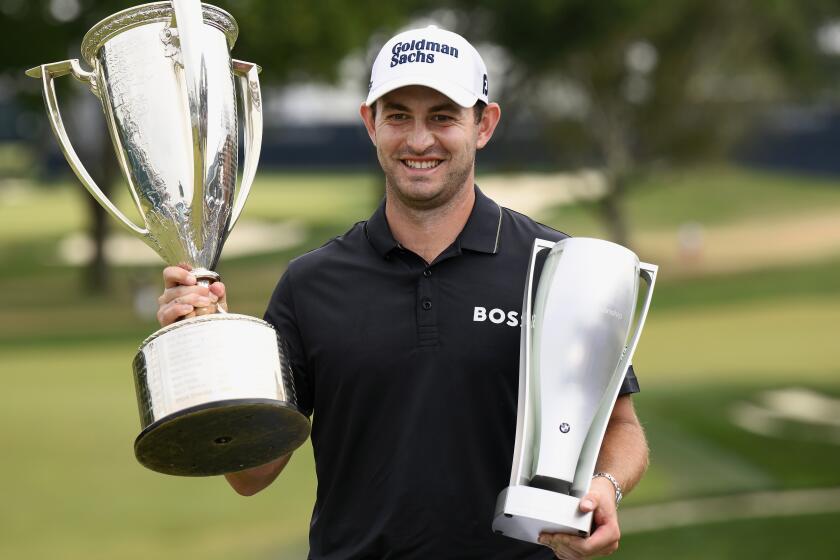 Patrick Cantlay celebrates after winning the BMW Championship golf tournament.
