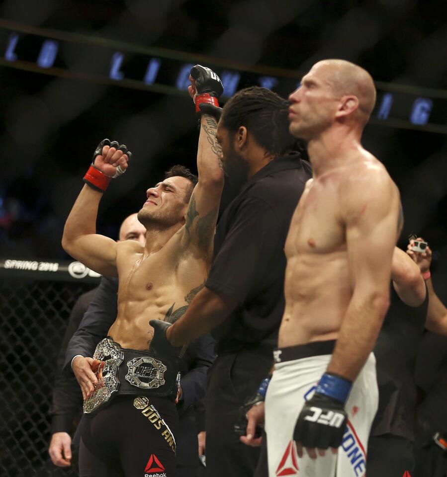 Rafael dos Anjos celebrates his first-round win over Donald Cerrone in a mixed martial arts bout at UFC Fight Night on Saturday, Dec. 19, 2015, in Orlando, Fla. (Jacob Langston/Orlando Sentinel via AP)