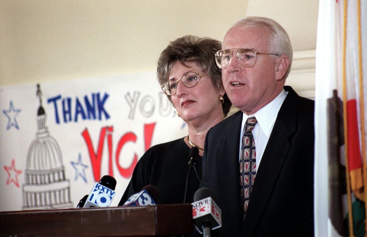 Rep. Vic Fazio, joined by his wife Judy, announces to a gathering of friends and supporters in the Woodland Hote, in Woodland, Calif., on Nov. 17, 1997, that he will not seek reelection to the House of Representatives next term, following a 10-term career in Congress. Fazio, a Democratic congressman from California who served for 20 years and rose to become an influential party leader in the House, has died. Fazio's death was announced Wednesday, March 26, 2022, by House Speaker Nancy Pelosi, although her office didn't provide details. He was 79. (Dick Schmidt/The Sacramento Bee via AP)