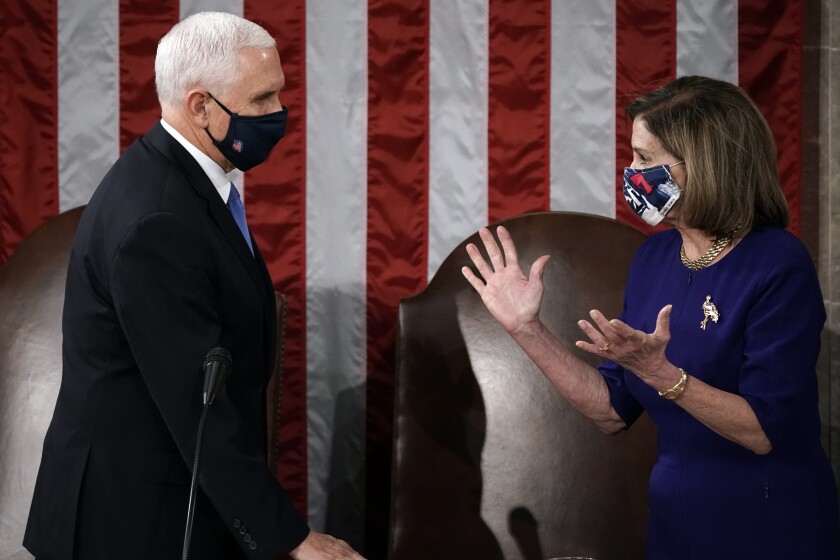 House Speaker Nancy Pelosi, D-San Francisco, and Vice President Mike Pence talk on Jan. 6.