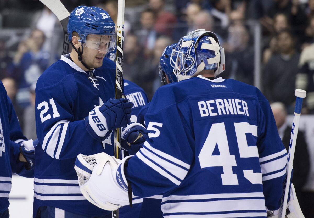 Toronto forward James van Riemsdyk and goalie Jonathan Bernier celebrate after the Maple Leafs' 5-2 win over the Lightning on Nov. 20. According to Forbes, the Maple Leafs are the most valuable NHL franchise, worth an estimated $1.3 billion.