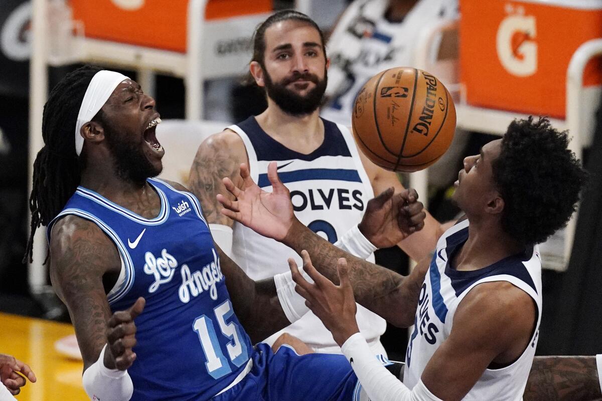 Lakers center Montrezl Harrell celebrates after dunking against the Timberwolves.