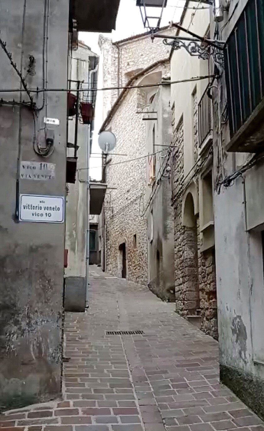 Narrow street in old Italian town