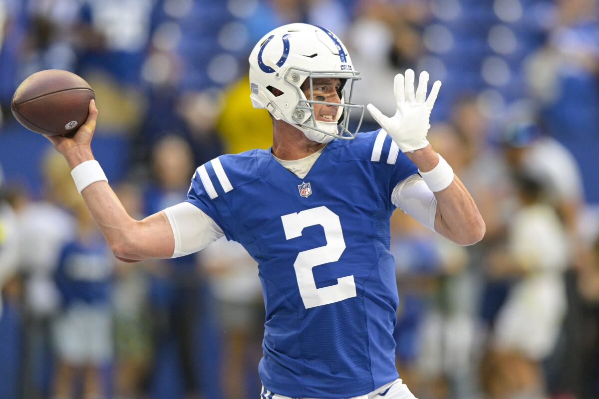 FILE - Indianapolis Colts quarterback Matt Ryan (2) throws before before an NFL preseason football game against the Tampa Bay Buccaneers in Indianapolis, Saturday, Aug. 27, 2022. On Sunday, for the first time in a meaningful NFL game, Ryan will pull on a blue-and-white jersey. (AP Photo/Doug McSchooler, File)