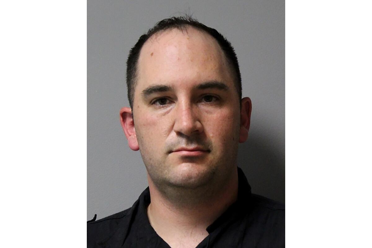 A police booking photo of U.S. Army Sgt. Daniel Perry