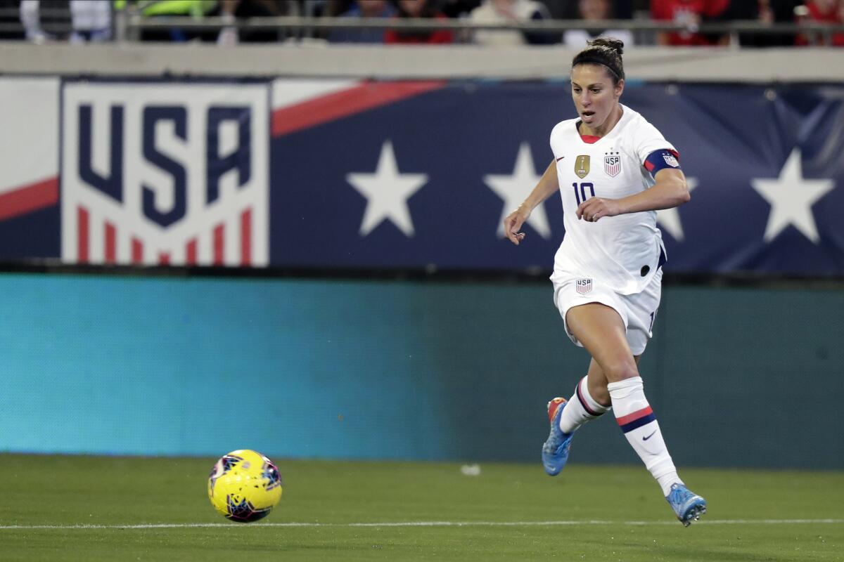 USA forward Carli Lloyd moves the ball against Costa Rica during an international friendly soccer match in 2019.