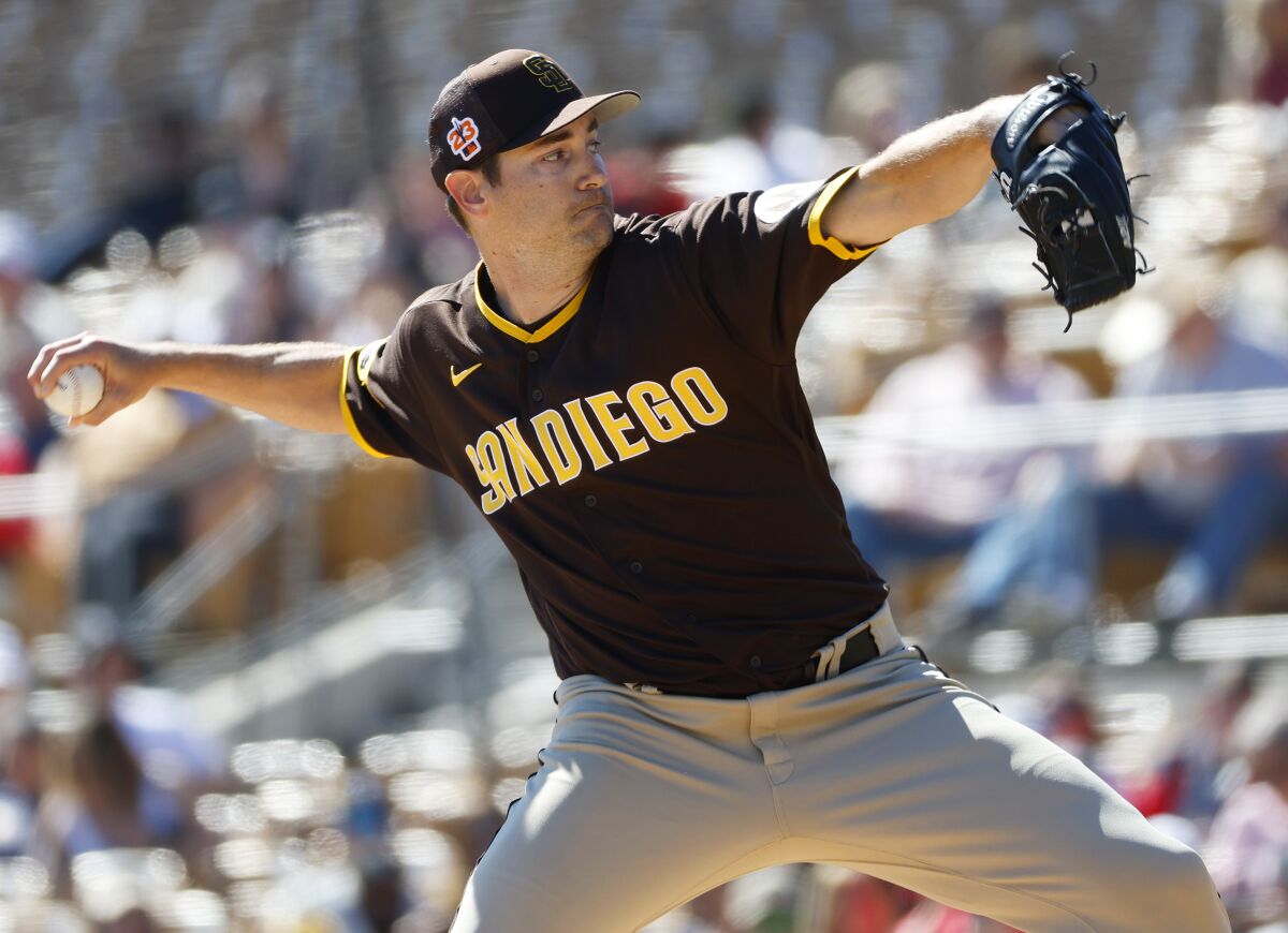 Padres pitcher Seth Lugo throws against the White Sox in a spring training game on Feb. 25.