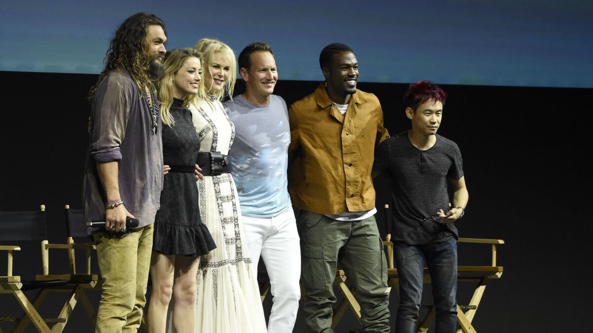 Jason Momoa, from left, Amber Heard, Nicole Kidman, Patrick Wilson, Yahya Abdul-Mateen II and director James Wan attend the panel for "Aquaman" on day three of Comic-Con.