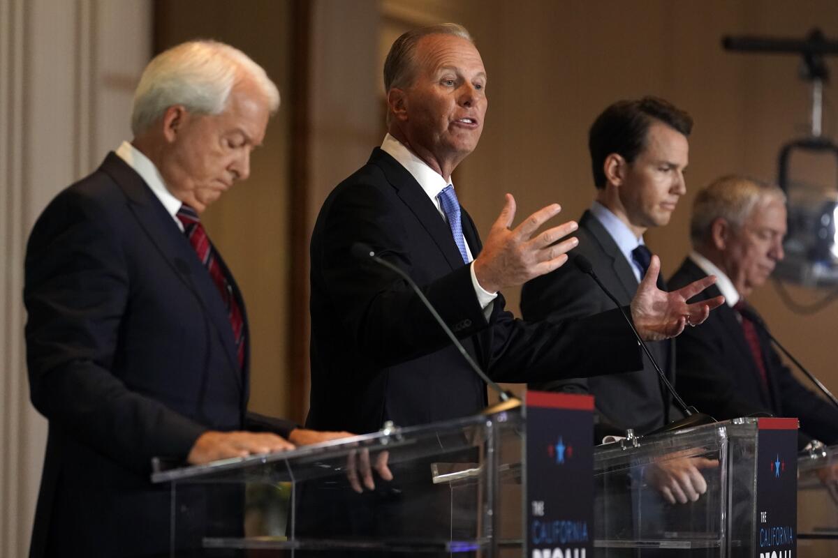 In this Aug. 4, 2021 file photo from left, Republican candidates for California Governor John Cox, Kevin Faulconer, Kevin Kiley and Doug Ose participate in a debate at the Richard Nixon Presidential Library Wednesday, Aug. 4, 2021, in Yorba Linda, Calif. Faulconer has long been viewed as a potential Republican candidate for governor, and he's now running in the Sept. 14 recall election against Democratic Gov. Gavin Newsom. (AP Photo/Marcio Jose Sanchez, File)